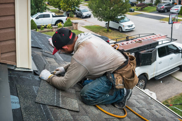 Professional Roofing technician working in North Eastham, MA